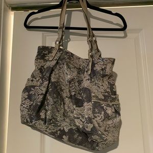 B. Makowsky grey purse with flowers